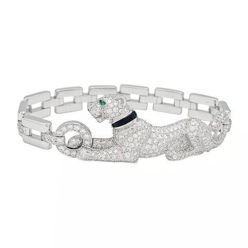 Bracelet Bracelet Cartier "Panthère de Cartier" en or blanc, diamants, émeraude et onyx. 58 Facettes 31544