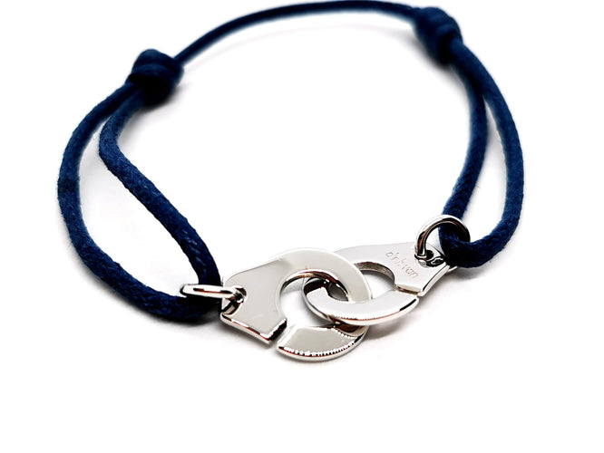 Bracelet Dinh Van Bracelet Cordon Menottes Or blanc 58 Facettes 1292103CN
