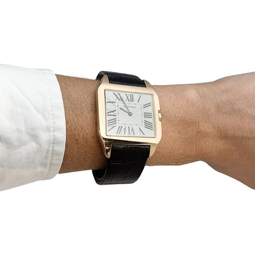 Montre Montre Cartier modèle "Santos Dumont" en or rose sur cuir. 58 Facettes 31929