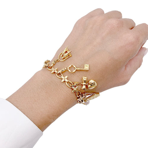 Bracelet Bracelet Louis Vuitton, "Idylle", breloques, or jaune, or blanc, perles. 58 Facettes 33013
