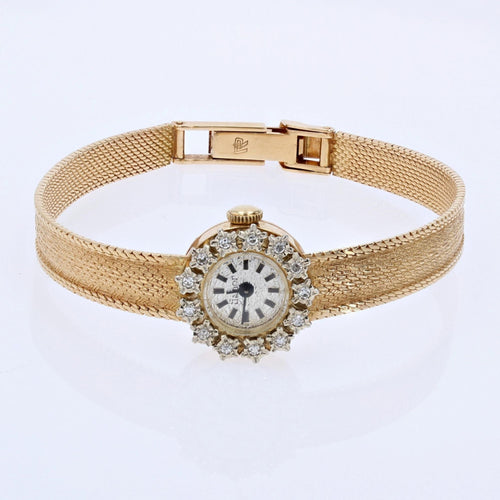 Montre Montre or jaune diamants de dame 58 Facettes 22-413