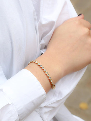 Bracelet Bracelet tennis vintage or jaune et diamants en serti clos 58 Facettes J92