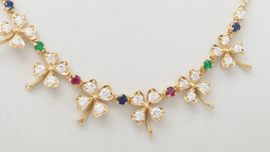 Collier Collier trèfles en or jaune et diamants 58 Facettes 32546