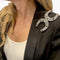 Broche Broche "Fers à Cheval" en platine et diamants. 58 Facettes 31655