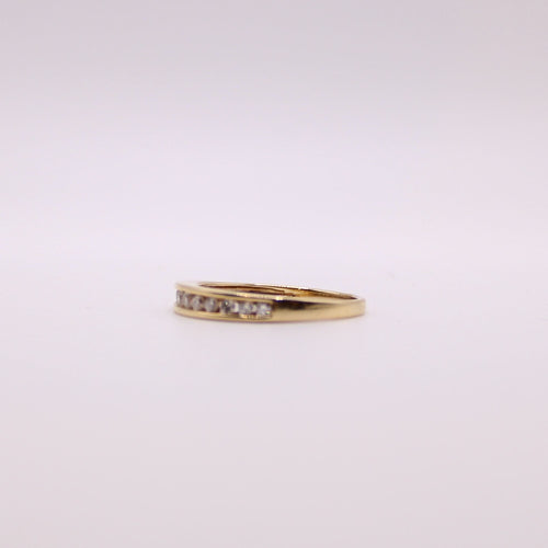 Bague Alliance demi-tour or jaune et diamants serti rail 58 Facettes