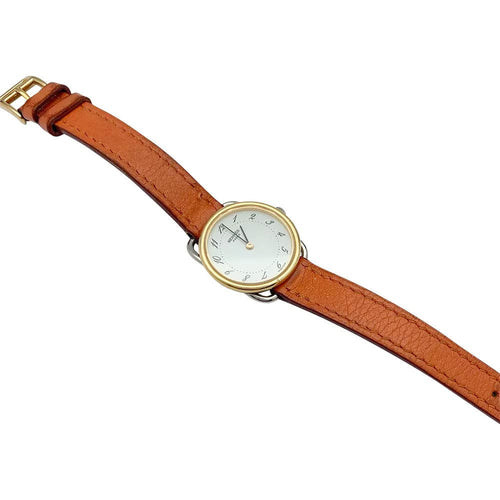 Montre Montre Hermès, "Arceau", plaqué or et acier sur cuir. 58 Facettes 31969