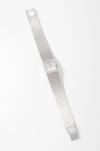 Montre Montre Tissot or gris et diamant 58 Facettes 0