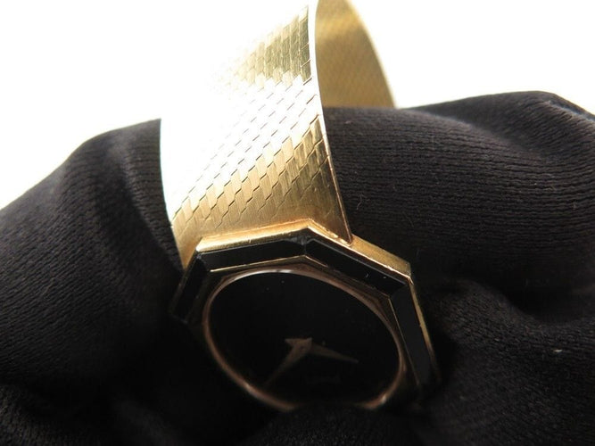Montre vintage montre PIAGET octogonal onyx 26mm or jaune 18k mecanique 58 Facettes 254507