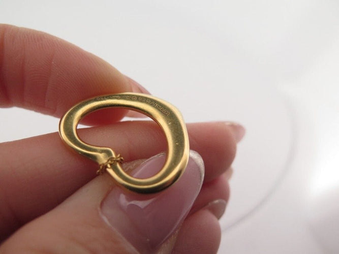 Collier collier TIFFANY & CO open ht 22mm peretti en or jaune 18k 58 Facettes 256341