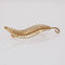 Broche Broche or jaune d'occasion feuille de fougère 58 Facettes CVBR60