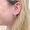 Boucles d'oreilles Boucles d'oreilles Pomellato "Colpo di Fulmine", or blanc, péridots, diamants. 58 Facettes 32766