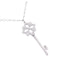 Collier Collier Tiffany & Co, "Clé", en platine, or blanc et diamants. 58 Facettes 33064