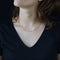 Collier Chaine en or fil plat torsadé 58 Facettes CVCH8