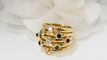 Bague 53.5 Multi Anneaux En Or Jaune Cabochons Rubis, Saphirs Et émeraudes 58 Facettes 32034