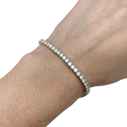 Bracelet Ligne tennis Gubelin or blanc diamants. 58 Facettes 30975