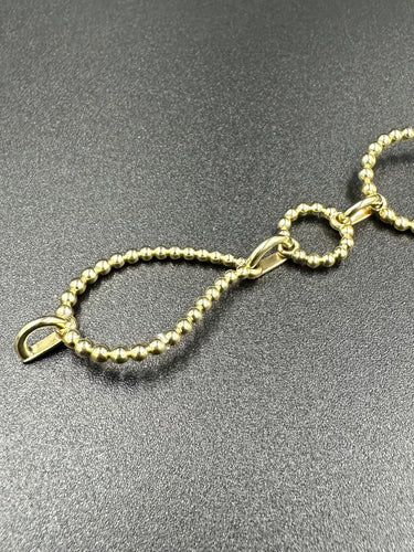 Bracelet BUCHERER. Bracelet Bubbles or jaune 18K 58 Facettes