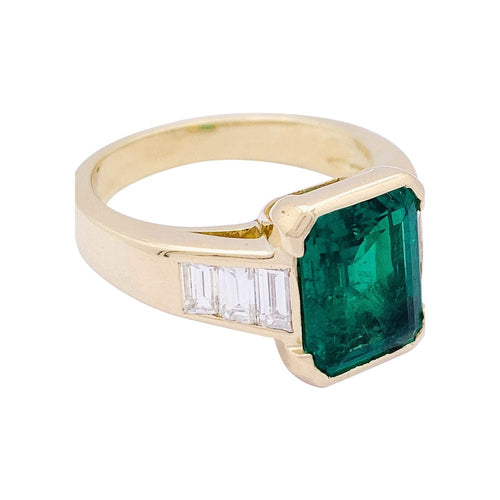 Bague 56 Bague, or jaune, émeraude et diamants. 58 Facettes 33327