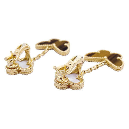 Boucles d'oreilles Boucles d'oreilles Van Cleef & Arpels "Lucky Alhambra" or jaune, nacre blanche, oeil de tigre. 58 Facettes 33555
