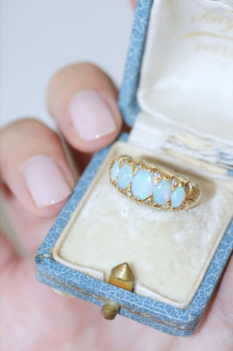 Bague Bague jarretière opales et diamants 58 Facettes