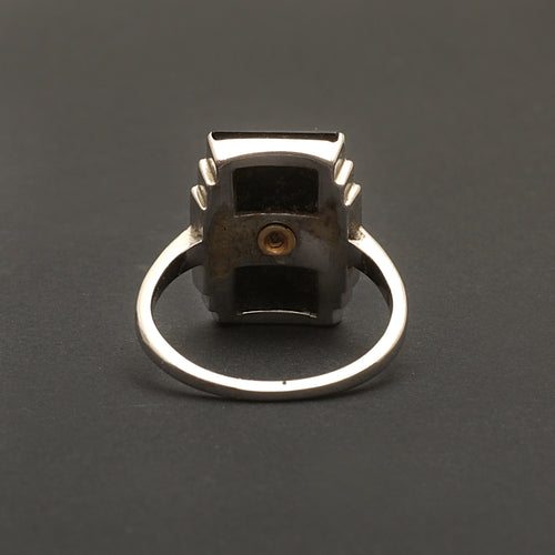 Bague Bague Art Déco en or gris, onyx et diamant "Blink" 58 Facettes 1966