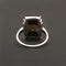 Bague Bague Art Déco en or gris, onyx et diamant "Blink" 58 Facettes 1966