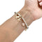 Bracelet Bracelet breloques Dodo, argent et or. 58 Facettes 31776
