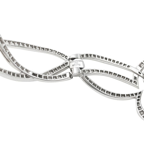 Montre Montre Chanel "Fil de Camélia" en or blanc et diamants. 58 Facettes 31123
