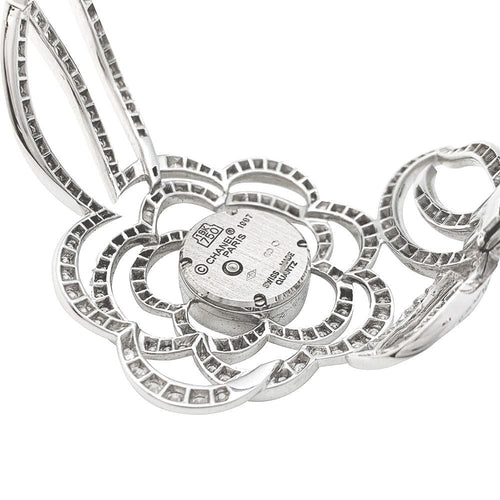Montre Montre Chanel "Fil de Camélia" en or blanc et diamants. 58 Facettes 31123