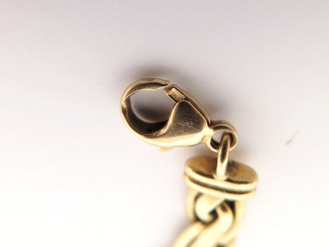Bracelet bracelet gourmette maille torsadee en or jaune 18k 58 Facettes 254718