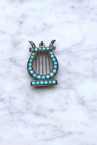 Pendentif Médaillon Lyre argent et turquoises 58 Facettes