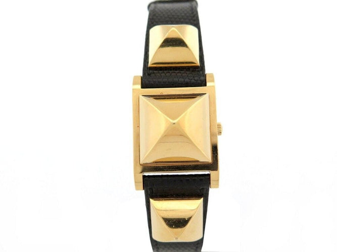 Montre montre HERMES medor 23 mm quartz en plaque or et cuir noir en 58 Facettes 243860
