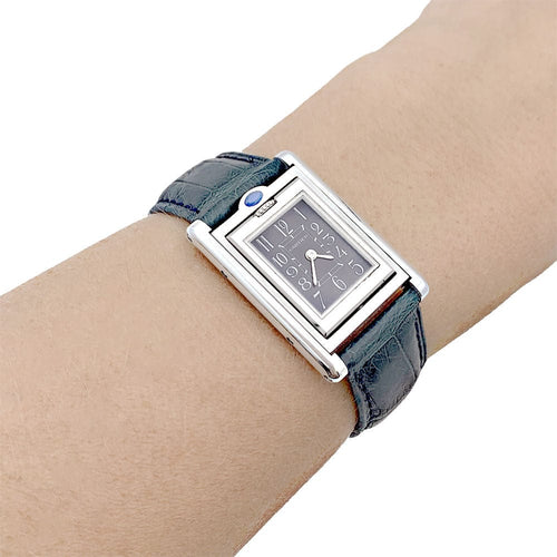 Montre Montre Cartier "Tank basculante" acier, cuir. 58 Facettes 33571