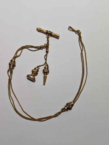 Collier Chaîne giletière en or 58 Facettes