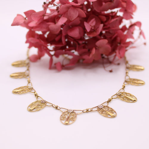 Collier Collier ancien, Draperie, Or jaune 18 carats, Filigrane 58 Facettes