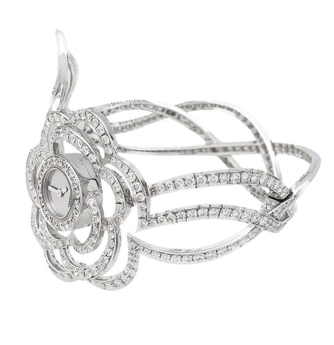 Montre Montre Chanel "Fil de Camélia" en or blanc et diamants. 58 Facettes 31123