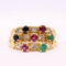 Bague Bague émeraudes, saphirs, rubis et pierre blanches 58 Facettes