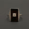 Bague Bague Art Déco en or gris, onyx et diamant "Blink" 58 Facettes 1966