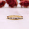 Bague Alliance demi-tour or jaune et diamants serti rail 58 Facettes