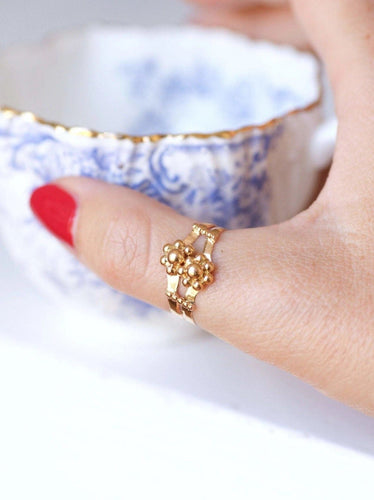 Bague Bague ancienne fleurs et boules en or 18Kt 58 Facettes