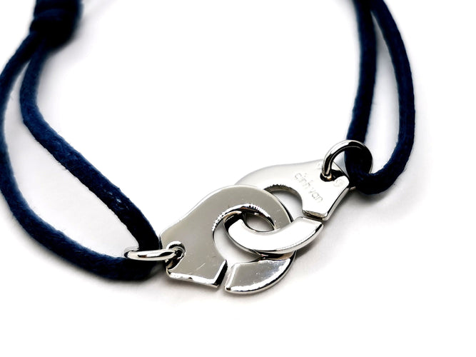 Bracelet Dinh Van Bracelet Cordon Menottes Or blanc 58 Facettes 1292103CN
