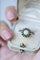 Bague Bague en or rose, opale, diamants et émail 58 Facettes