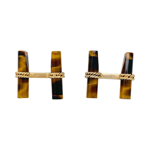 Boutons de manchette Boutons de manchette Boucheron en or jaune et oeil de tigre . 58 Facettes 31495