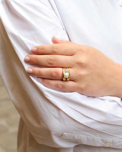 Bague Bague vintage en or jaune, perle et saphirs 58 Facettes 705