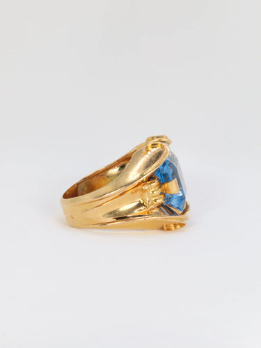 Bague Bague cocktail vintage en or et pierre bleue 58 Facettes 725