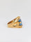 Bague Bague cocktail vintage en or et pierre bleue 58 Facettes 725