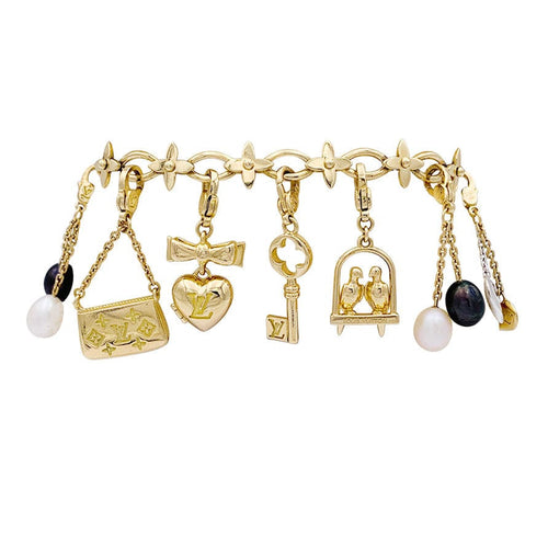 Bracelet Bracelet Louis Vuitton, "Idylle", breloques, or jaune, or blanc, perles. 58 Facettes 33013