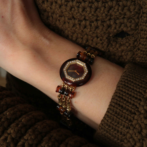 Montre Boucheron Paris - Montre en or et écaille de tortue 58 Facettes