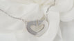 Collier Collier Cartier Symboles cœur en or blanc 58 Facettes