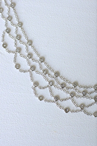 Collier Collier Draperie or blanc et diamants 58 Facettes