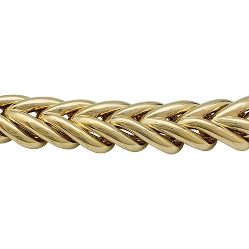 Bracelet Barcelet Boucheron "Tressé" en or jaune. 58 Facettes 31259